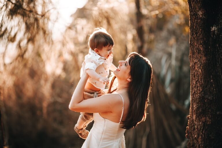 a mother is holding her baby for Maternity DNA test by Evidexa DNA Test Solution